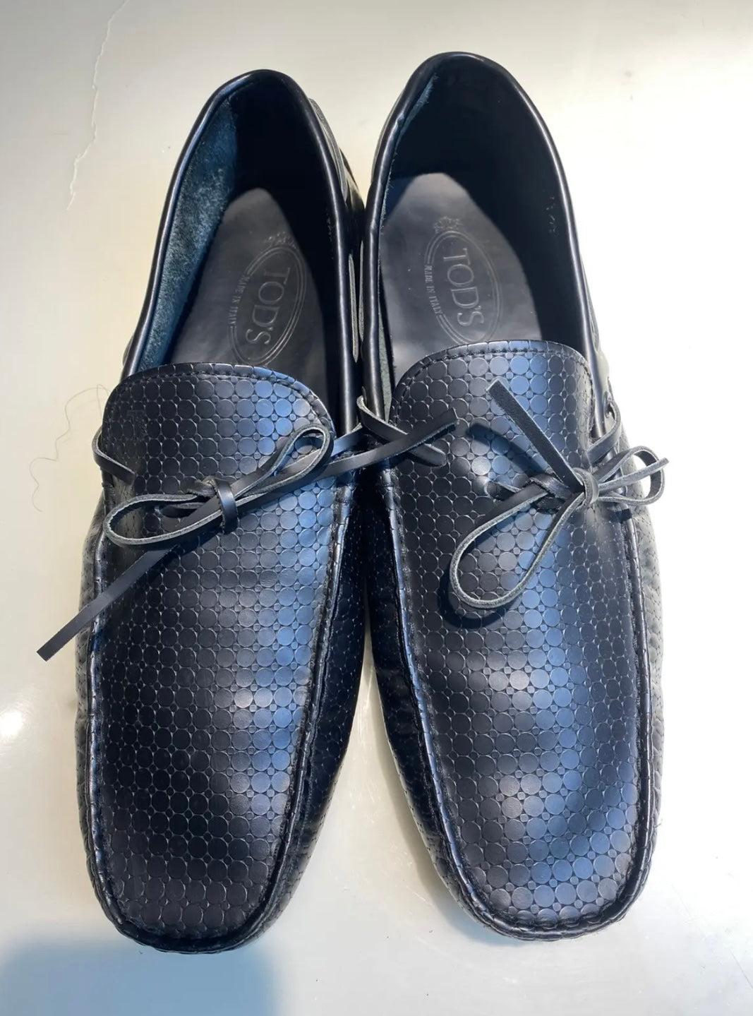 Tod’s Black Textured Leather Bow Loafers