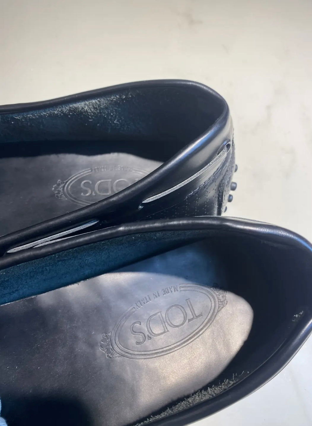 Tod’s Black Textured Leather Bow Loafers